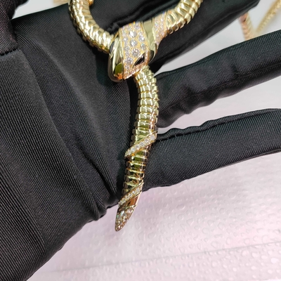 Collar de oro amarillo de 18 Kt con diamantes y ojos de ónix negro